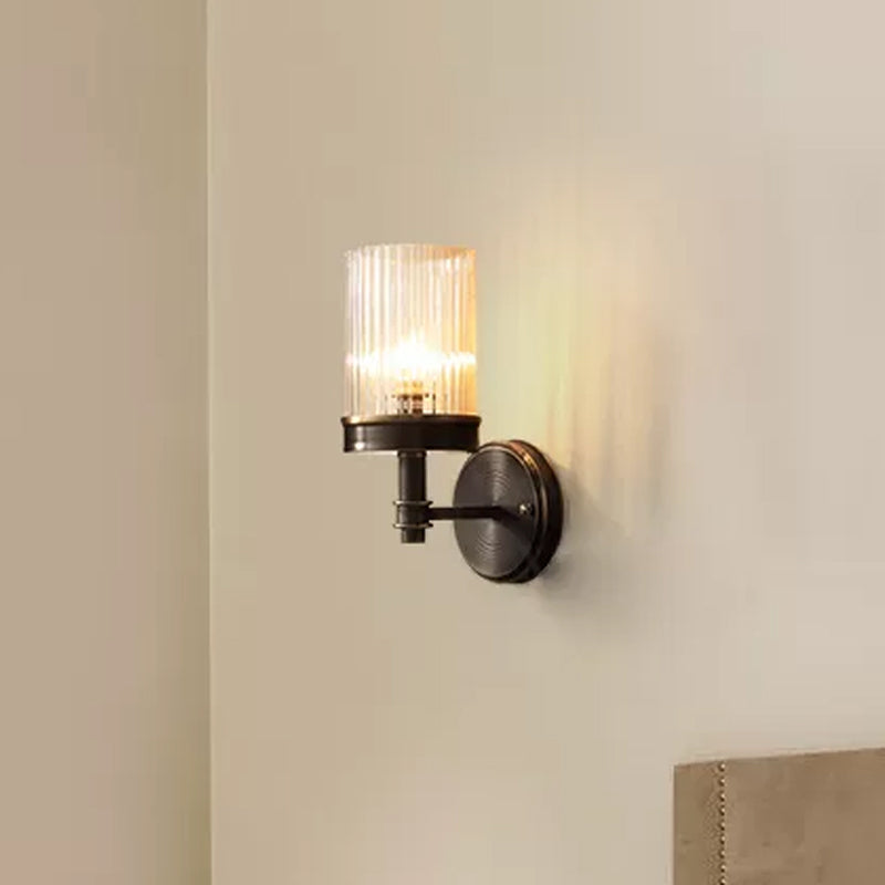 1-Light Wall-Mounted Lamp Traditional Cylinder Transparent Glass Wall Light in Brown/Gold above Bed