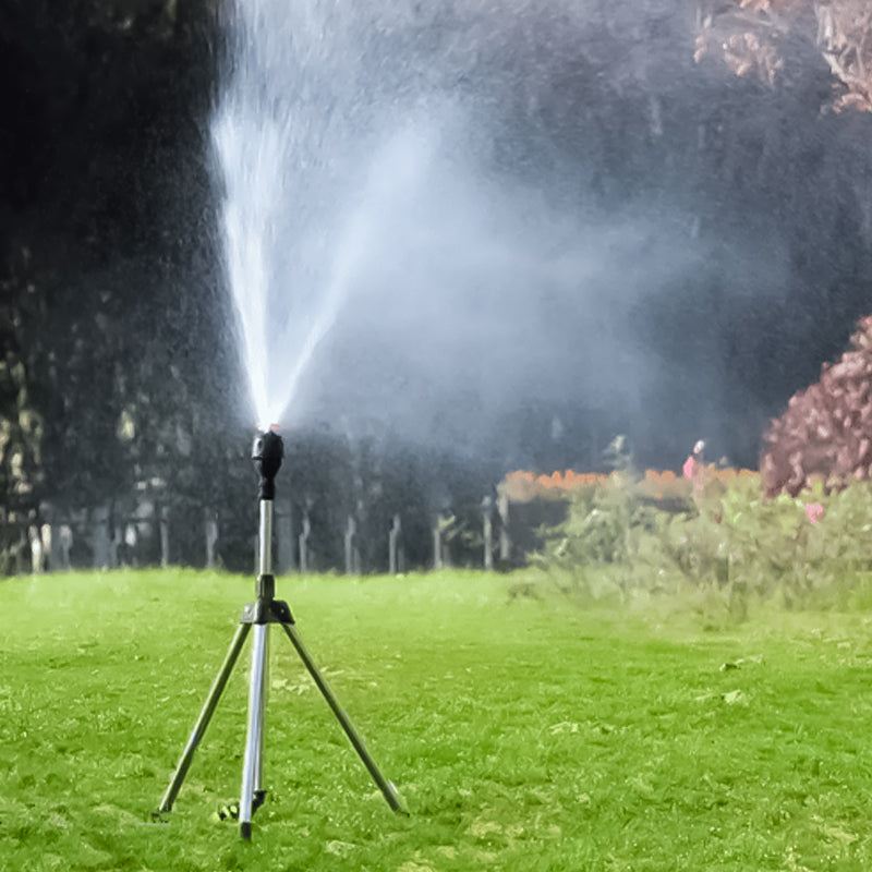 Automatic rotating tripod sprinkler