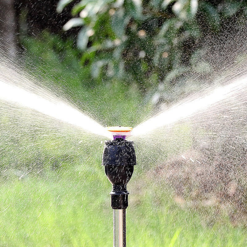 Automatic rotating tripod sprinkler