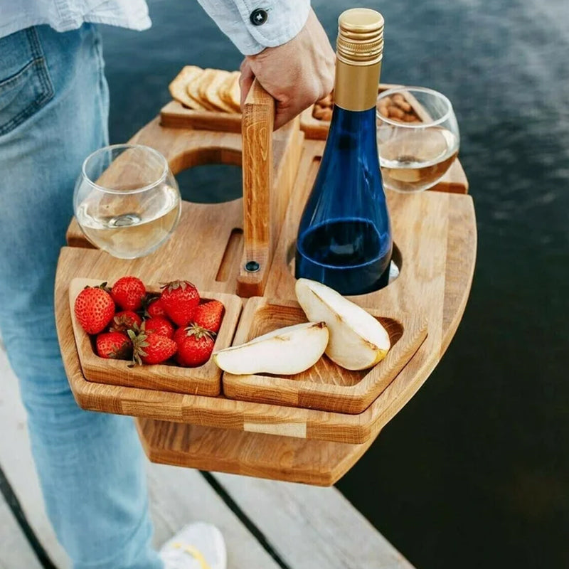 Compact picnic table with wooden bottle holder