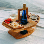 Compact picnic table with wooden bottle holder