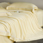 Silky-smooth cotton satin bedding set with fine decorative ribbon and pillowcases