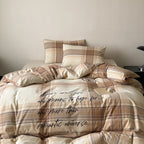 Checked cotton percale bed linen set with calligraphic script print