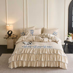 Bedding set with tiered ruffle, fine decorative seam and butterfly motif