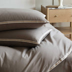 Premium cotton satin duvet cover with piping and hotel closure