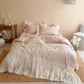 Bedding set with floral relief embroidery, gathered frill and bed skirt