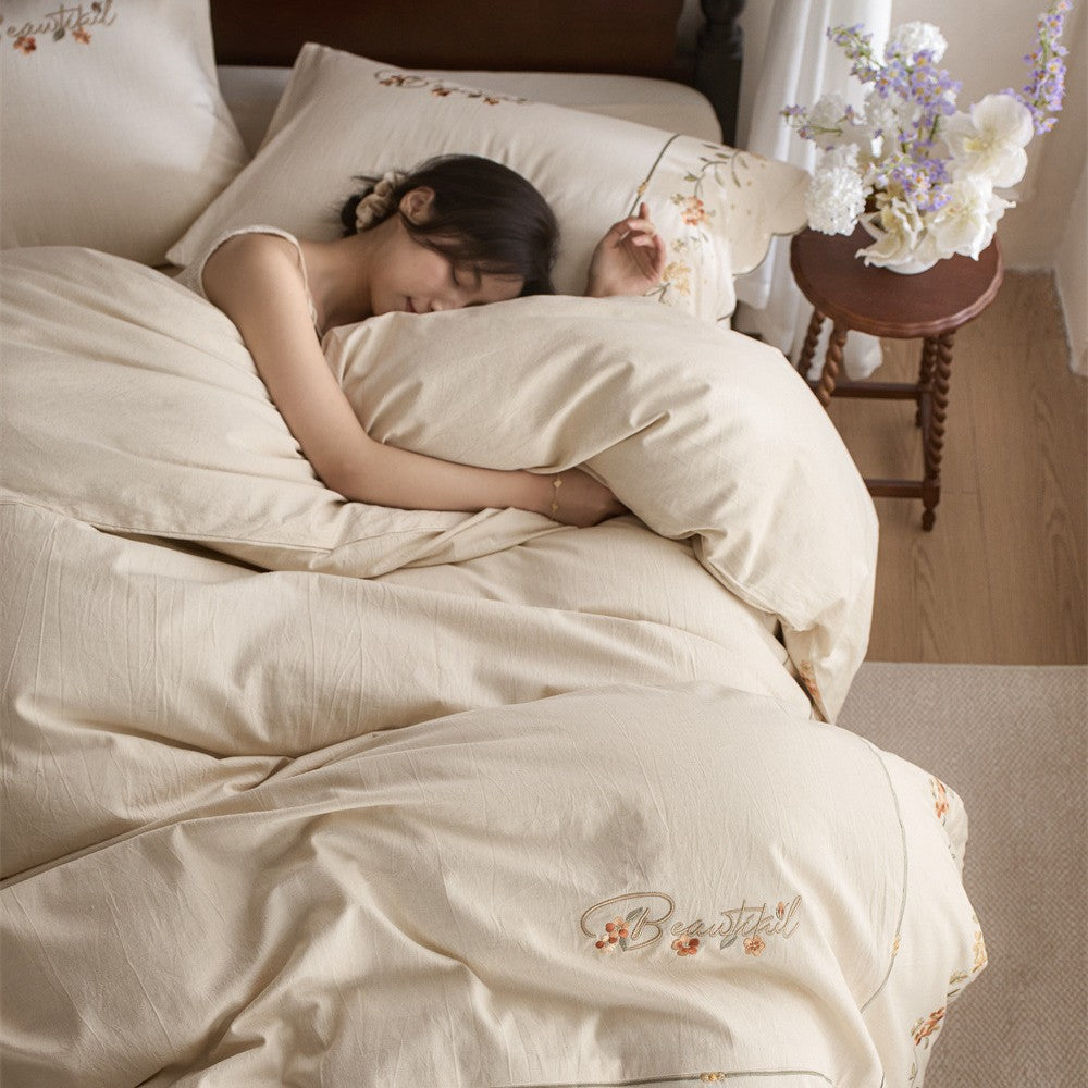 Embroidered Cotton-Linen Bedding Set with Wavy Hem and Floral Border Motif