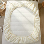 Breathable climate-regulating topper with hollow fiber filling and elastic all-round rubber