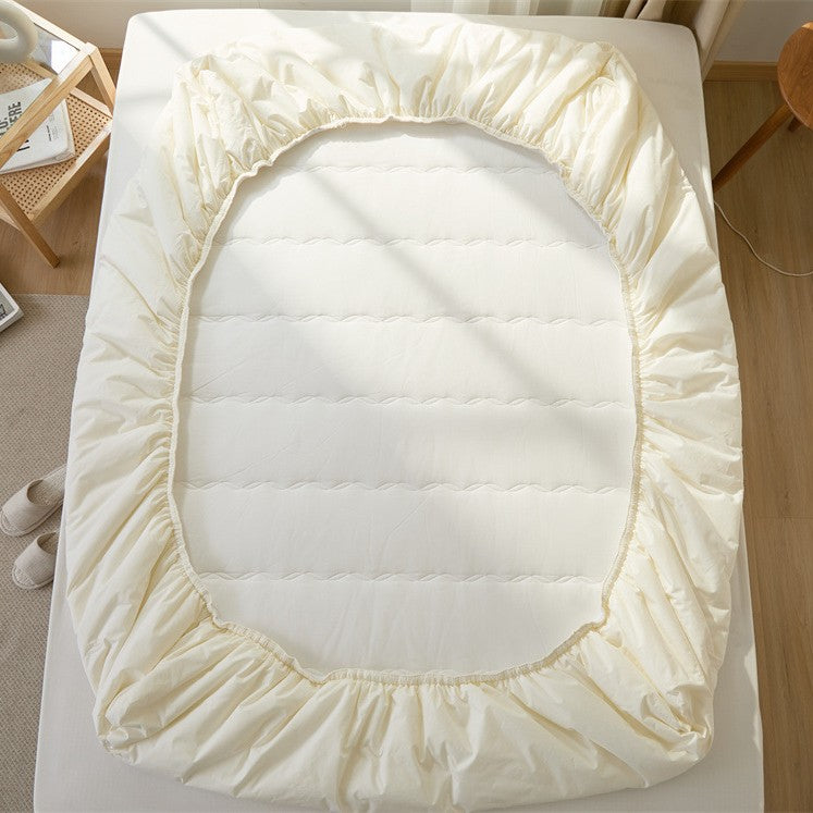 Breathable climate-regulating topper with hollow fiber filling and elastic all-round rubber