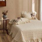 Romantic bedding set with frill, quilted panels and floral watercolor look