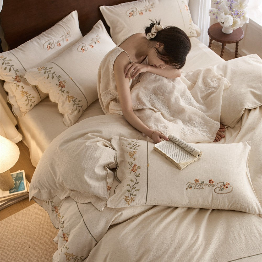 Embroidered Cotton-Linen Bedding Set with Wavy Hem and Floral Border Motif