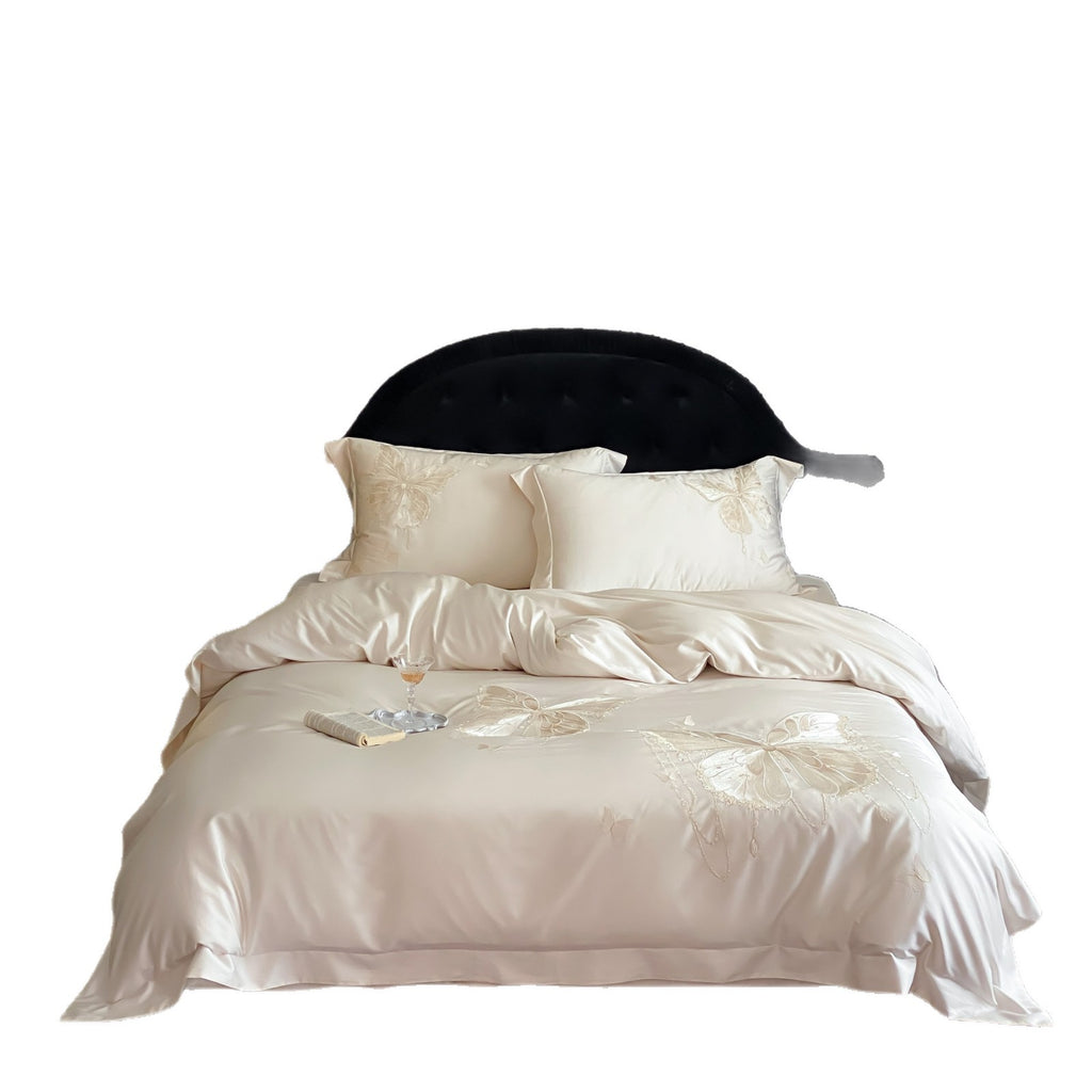 Luxurious satin bedding set with embroidered butterfly motifs and silky glossy finish