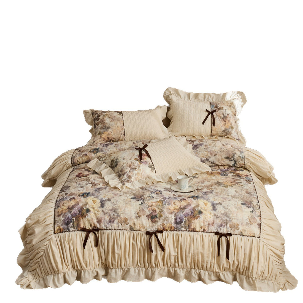 Romantic bedding set with frill, quilted panels and floral watercolor look