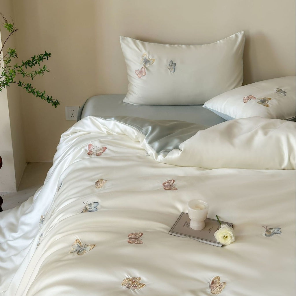 Luxury satin duvet cover set with embroidered butterfly appliqués