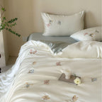 Luxury satin duvet cover set with embroidered butterfly appliqués