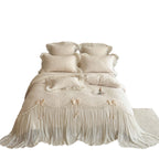 Romantic bedding set made of cotton satin with quilted duvet cover, decorative ruffled trim and bow appliqués