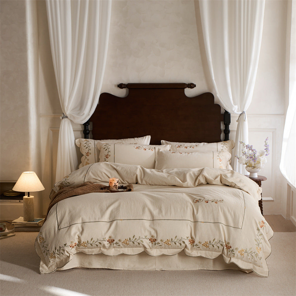 Embroidered Cotton-Linen Bedding Set with Wavy Hem and Floral Border Motif