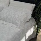Quilted cotton bedspread set with honeycomb quilting, lace trim, and matching pillow covers