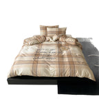Checked cotton percale bed linen set with calligraphic script print
