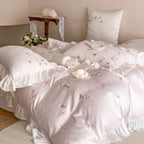 Satin bedding set with luxurious cotton satin quality, embroidered butterflies and roses, and ruffle