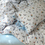 Cotton duvet cover set with subtle animal and balloon illustration, breathable all-season quality