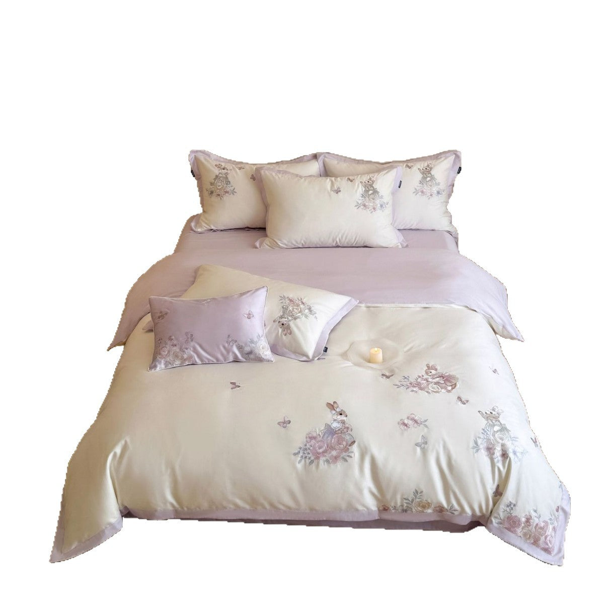 Finely embroidered bedding set with floral motifs and animal appliqués