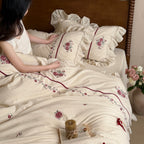 Romantic cotton-linen bedding set with ruffle, rose embroidery and bolster pillow