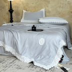 Cotton satin duvet cover set with decorative lace appliqué and embroidered medallion