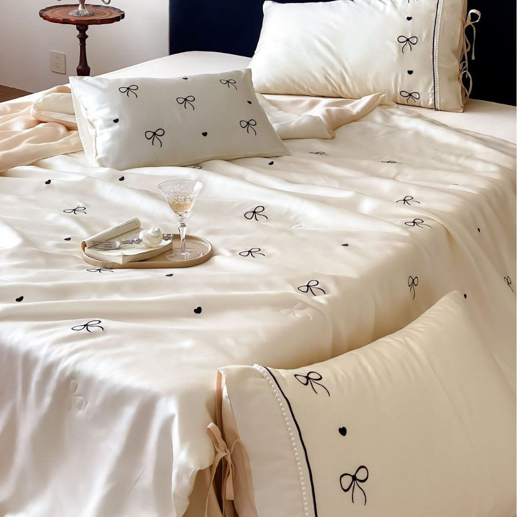 Fine silk look cotton satin bed linen set with delicate ribbon embroidery and ties