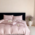 Luxurious satin bedding set with delicate polka dots and bow embroidery