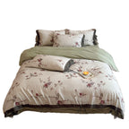 Percale bedding set with floral vintage embroidery, lace trim, and ties