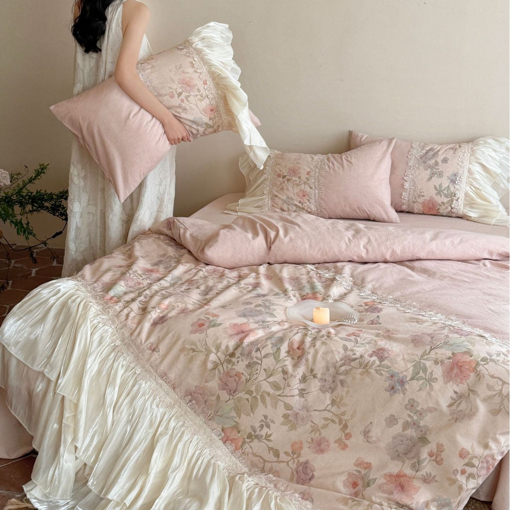 Bedding set with pleated frill, lace border, and floral print