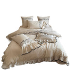 Bedding set with embroidered ruffles and linen look