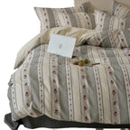 Breathable bedding set made of cotton muslin with striped and rose jacquard