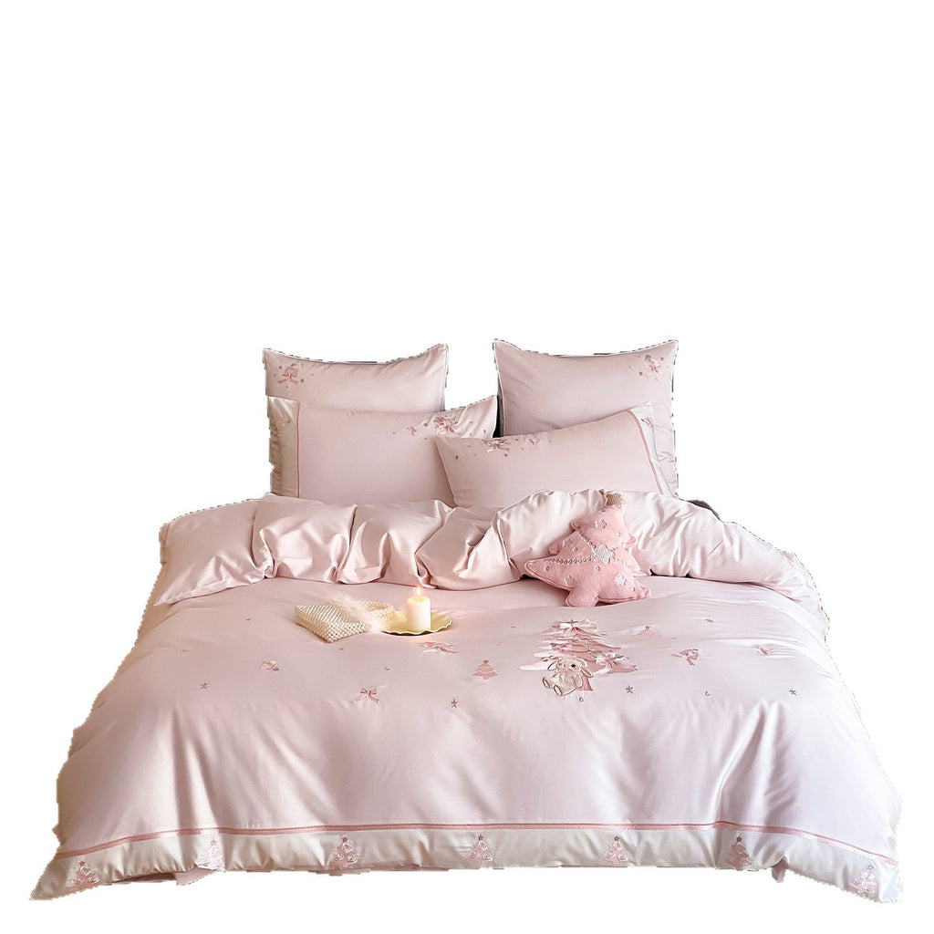 Romantic bedding set made of fine cotton satin with delicate embroidery and decorative cushion