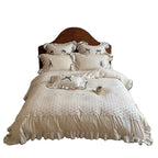Romantic cotton-linen bed linen set with broderie anglaise, frills, and contrast piping