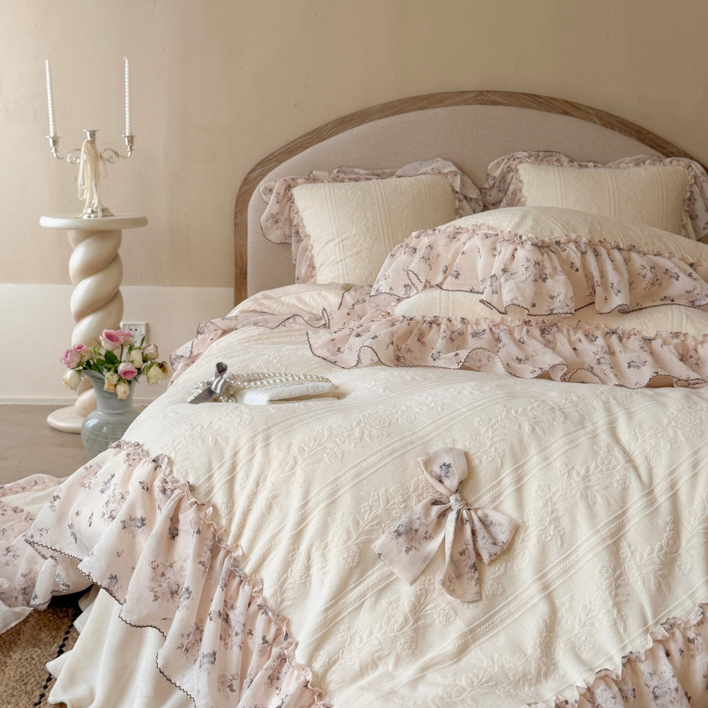Romantic cotton bedding set with jacquard structure, ruffles and bow trim